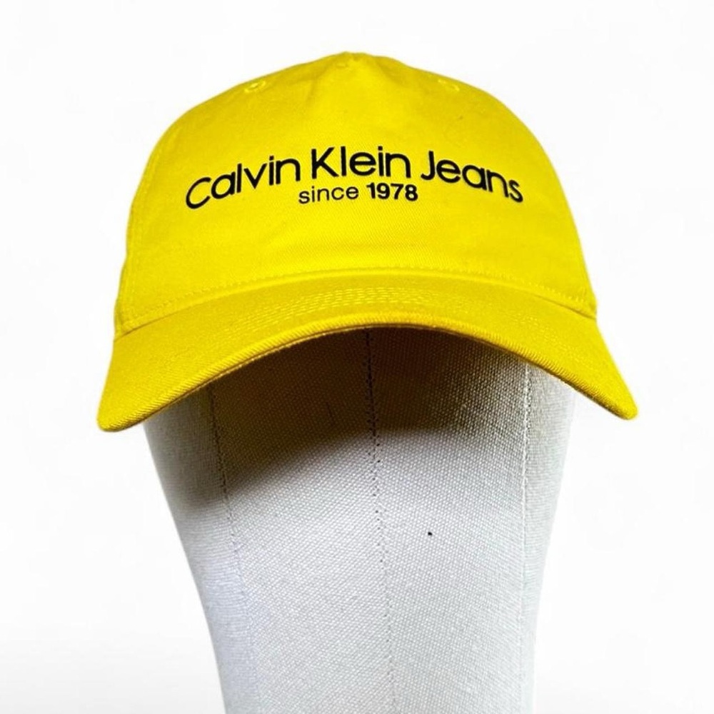 Men’s 1990s Calvin Klein Jeans baseball bright yellow cap with snap closure